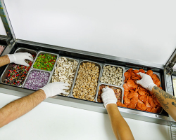 Hands in Topping Line