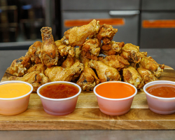 Wings Piled with Sauces